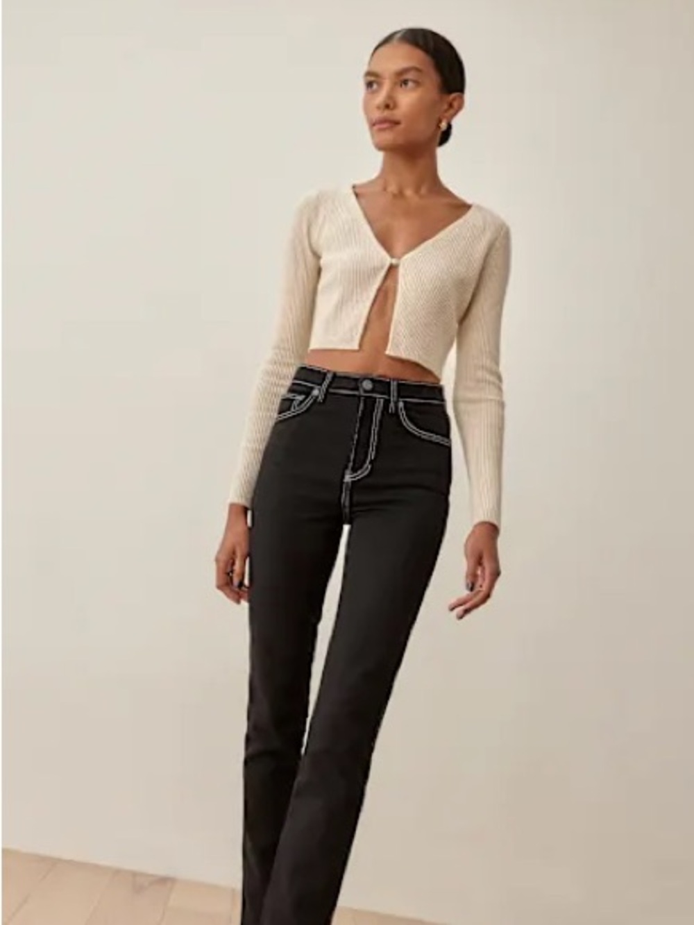 Reformation Black High-Rise Jeans with white Stitching and front-leg zipper